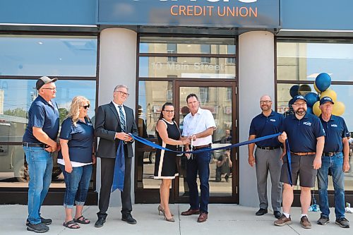 Stride Credit Union employees and CEO, along with area dignitaries, cut the ribbon to commemorate the new local business’s grand opening.
(Rylee Gerrard/The Brandon Sun)