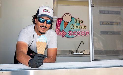ROBERT LEE / FREE PRESS
Paul Abdul-Raymond, owner of the Classic Scoop, is photographed in his ice cream trailer that appears at public events and private functions in Winnipeg on Thursday, August 13, 2026. 