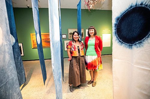 MIKAELA MACKENZIE / FREE PRESS
	
Artist Lourdes Still (left) and curator Riva Symko with Lourdesՠwork in the new exhibition Terra Cognita/Incognita at the Winnipeg Art Gallery-Qaumajuq on Thursday, Aug. 13, 2026.

For Jen story.
Free Press 2026