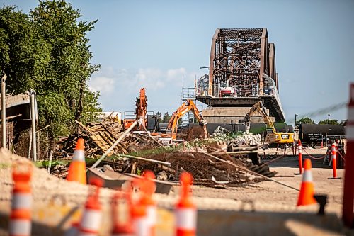 MIKAELA MACKENZIE / FREE PRESS
Demolition at the Arlington Street Bridge on Thursday, Aug. 13, 2026.
For Melissa story.
Free Press 2026