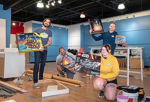 ROBERT LEE / FREE PRESS
(From left): Ian Makita, Jo Villaverde, Jason Poturica and Katelyn Dobranski, front, pose for a photo with prized lego sets in the new The Little Brick Market store on Grant Ave. in Winnipeg on Thursday, August 13, 2026. 