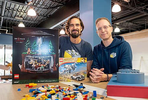 ROBERT LEE / FREE PRESS
Ian Makita and Jason Poturica, co-owners of The Little Brick Market set up their new store on Grant Ave. in Winnipeg on Thursday, August 13, 2026. The new and used Lego shop, is tripling its size after being open for roughly a year.