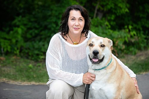 MIKAELA MACKENZIE / FREE PRESS
	
Tara Miller and her dog, Corbi, on Thursday, Aug. 13, 2026. Miller has had to make some difficult decisions regarding Corbi’s vet care, and animal shelters say rising vet bills are forcing more people to surrender their pets. 

For Tiago story.
Free Press 2026