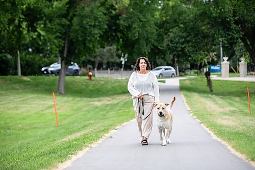 MIKAELA MACKENZIE / FREE PRESS
Tara Miller and her dog, Corbi, on Thursday, Aug. 13, 2026. Miller has had to make some difficult decisions regarding Corbi’s vet care, and animal shelters say rising vet bills are forcing more people to surrender their pets.
For Tiago story.
Free Press 2026