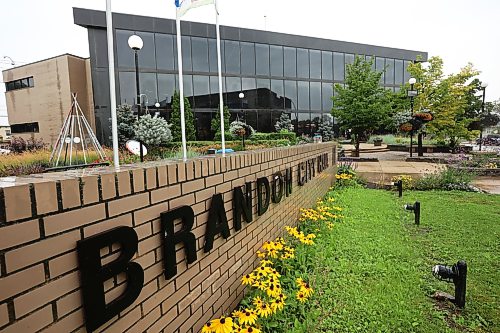 14082026
Flowers outside Brandon City Hall on a rainy Friday. 
(Tim Smith/The Brandon Sun)