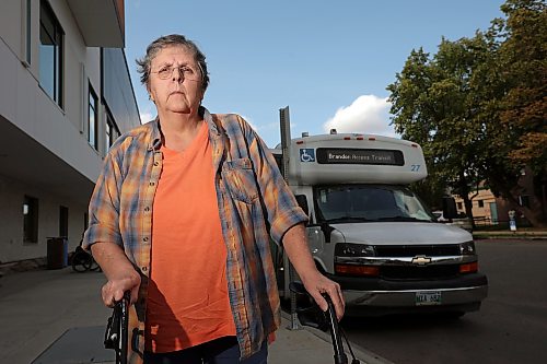 12082026
Caroline Fischer stands outside the Brandon Access Transit bus after being dropped off at the Brandon Regional Health Centre for dialysis treatment on Wednesday. Fischer is concerned that the bus often drops patients off at a distance from the hospital entrance which makes it challenging for individuals with mobility problems. (Tim Smith/The Brandon Sun)
***please cross-reference with Rylee story for accuracy