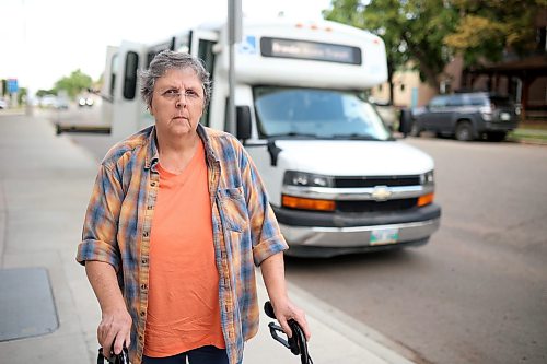 12082026
Caroline Fischer stands outside the Brandon Access Transit bus after being dropped off at the Brandon Regional Health Centre for dialysis treatment on Wednesday. Fischer is concerned that the bus often drops patients off at a distance from the hospital entrance which makes it challenging for individuals with mobility problems. (Tim Smith/The Brandon Sun)
***please cross-reference with Rylee story for accuracy