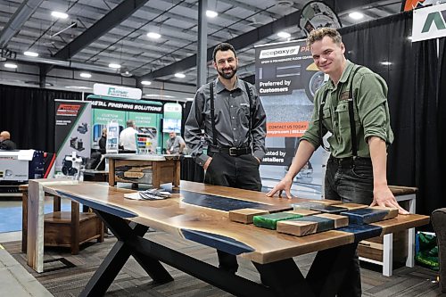 Ruth Bonneville / Free Press

Biz- Hutterite Manufacturing &amp; Associate Expo

EcoPoxy GM, Aaron Maendel with Jacob Maendel - custom creations woodworker, at their booth at the Expo Friday. 

EcoPoxy is a Canadian farm-based company that produces bio-based epoxies to inspire and empower woodworkers and artists to create beautiful projects.

Story: Hutterite Manufacturing &amp; Associate Expo  at Red River Exhibition Park for a feature on the growth of Hutterite manufacturers in Manitoba.

Story by Gabby 

Aug 14th,,  2026