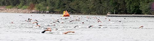 Kayakers, paddle boarders and boats keep an eye on Sprint swimmers during the Riding Mountain Triathlon on Saturday. (Perry Bergson/The Brandon Sun)
Aug. 15, 2026
