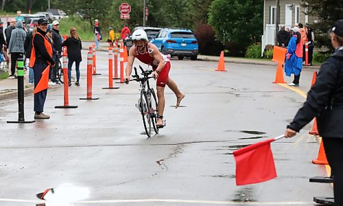 Olympic distance winner Terron Baker prepares to jump off his bike at the dismount line during the Riding Mountain Triathlon on Saturday. (Perry Bergson/The Brandon Sun)
Aug. 15, 2026