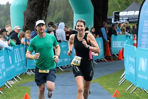 Loretta Kulchycki of Winnipeg (464) runs to the finish line just ahead of Devon Bell-Evans of Birtle (376) during the Riding Mountain Triathlon on Saturday. (Perry Bergson/The Brandon Sun)
Aug. 15, 2026