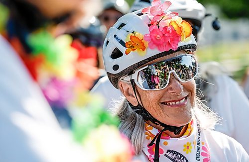 JOHN WOODS / FREE PRESS
Sarah Gravelle-MacKenzie and other women participate in the Fancy Women Bike Ride at the Legislature grounds Sunday, August 16, 2026. 

reporter: maggie