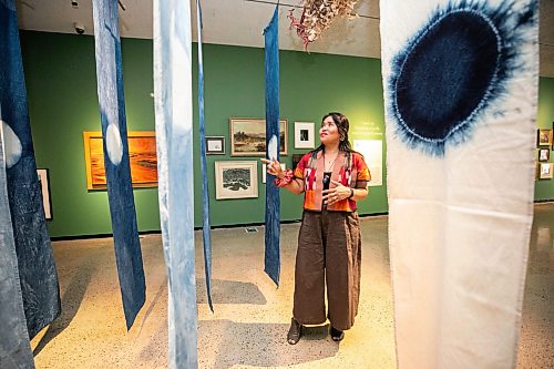 MIKAELA MACKENZIE / FREE PRESS
	
Artist Lourdes Still with her work in the new exhibition Terra Cognita/Incognita at the Winnipeg Art Gallery-Qaumajuq on Thursday, Aug. 13, 2026.

For Jen story.
Free Press 2026