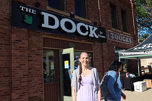Dock general manager Erin Wells stands in front of the restaurant in June. (Abiola Odutola/The Brandon Sun file)
