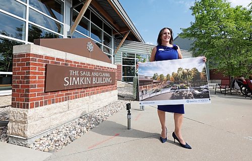 Ruth Bonneville / Free Press

Local Simkin Child Care 

CEO of the Saul &amp; Claribel Simkin Centre,  Laurie Cerqueti, with drawings outside the centre after press conference announcing the opening of new Child Care Centre to be built onto existing centre,  Monday. 

This new centre will offer Intergenerational programs bring older adults and children together for shared learning and cultural exchange. 

Also speaking at the event were representatives of the provincial and federal government including: Education and Early Childhood Learning Minister Tracy Schmidt
Ben Carr, member of Parliament, Winnipeg South Centre and others.  

See story by Maggie

Aug 1th,,  2026