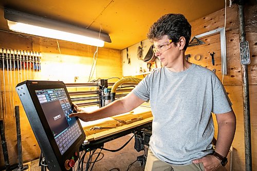 MIKAELA MACKENZIE / FREE PRESS
	
Woodworker Marina Bulan demonstrates the cnc machine in her workshop on Monday, Aug. 17, 2026. She started her business, Cedarella, after taking a cabinetry course at Red River.

For Dave Sanderson story.
Free Press 2026