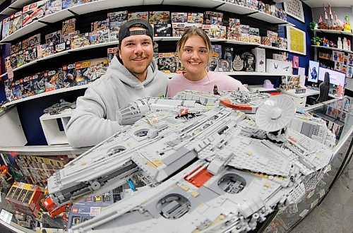 JOHN WOODS / FREE PRESS
Madison Froome and Ashton Romaniuk are photographed with a Lego 75192 Millennium Falcon in their new Lego store Romo’s Bricks Tuesday, July 21, 2026.
reporter: aaron