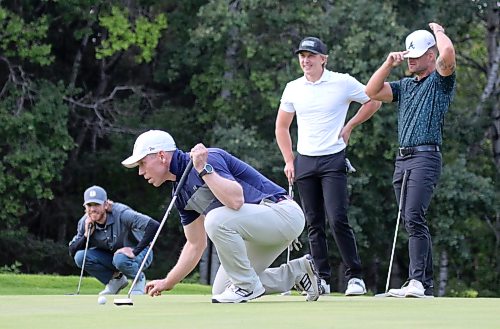 Joel Matthews lines up his match-sealing birdie putt during the first round of the Tamarack golf tournament men's championship flight matches at Clear Lake Golf Course on Tuesday, while Brad Pardy, Grady Chuback and Marcus Friess look on. (Thomas Friesen/The Brandon Sun)