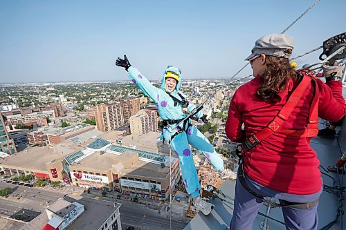 Ruth Bonneville / Free Press
LOCAL - Easter Seal Drop Zone
Sam Parker is excited about stepping off the ledge of the Manitoba Hydro Building with blue super hero costume on to raise funds for Easters Seals Tuesday morning.
The annual event sees participants rappel from the top of the buildings to raise funds for Manitoba Possible.
See story by Zoe
Aug 18th,, 2026