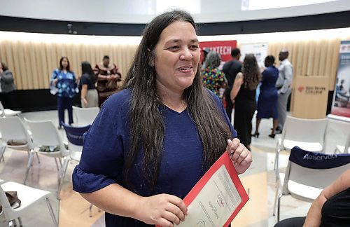 Ruth Bonneville / Free Press

LOCAL - Shelter Support Workers

Pauline Pollard celebrates receiving her certificate of accreditation badge as in shelter support along with others at RRC Polytech Exchange District Campus Tuesday.  

RRC Polytech celebrated the latest cohorts of students who will begin meaningful careers in their communities, as the newest graduates of the Shelter Support Worker micro-credential program.

See story by Maggie

Aug 18th,,  2026