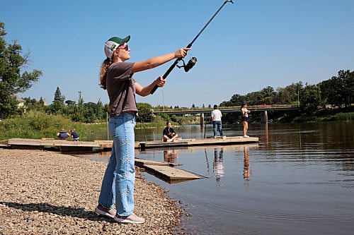 18082026
Katelin Guimond fishes from the shore of the Souris River in Souris, Manitoba on Tuesday while visiting the westman community with family and friends.
(Tim Smith/The Brandon Sun)