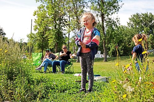 18082026
Amy Guimond fishes from the bank of Plum Creek in Souris, Manitoba on Tuesday while visiting the westman community with family and friends.
(Tim Smith/The Brandon Sun)