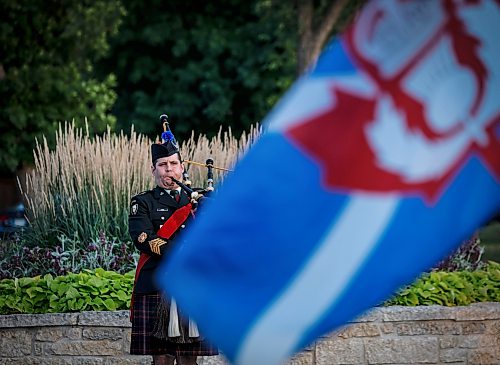 JOHN WOODS / FREE PRESS
Master warrant officer Dan Locke pipes as members of the Queen's Own Cameron Highlanders and people participate in a Dieppe Raid sunset commemoration ceremony at Vimy Ridge Park Tuesday, August 18, 2026. The ceremony remembered the regiment’s involvement in the Dieppe Raid.

reporter: standup