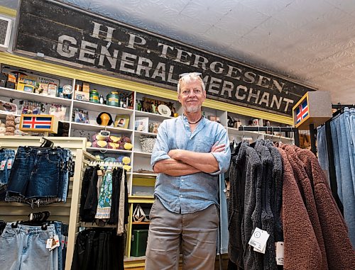 ROBERT LEE / FREE PRESS
Stefan Tergesen, owner of H.G. Tergesen &amp; Sons, poses in front of the original signage for the store on Tuesday, August 18, 2026. 