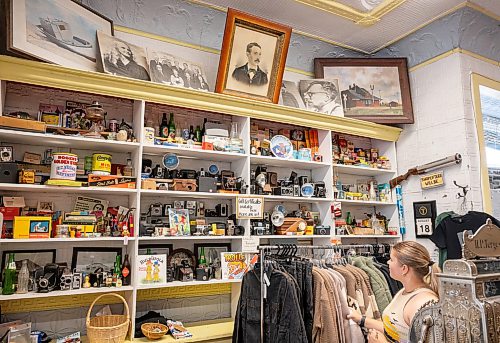 ROBERT LEE / FREE PRESS
A portrait of the original founder of H.G. Tergesen &amp; Sons, is displayed atop of owner Stefan Tergesen’s collection of antique cameras on Tuesday, August 18, 2026. The store has stood in the same spot since January 1, 1899.