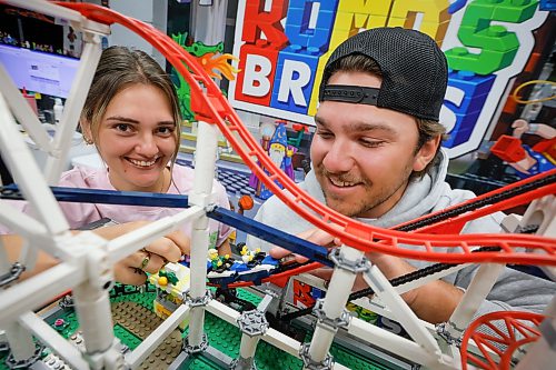 JOHN WOODS / FREE PRESS
Madison Froome and Ashton Romaniuk are photographed with a Lego 10261 Roller Coaster in their new Lego store Romo’s Bricks Tuesday, July 21, 2026.
reporter: aaron