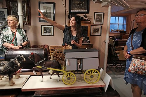 19082026
Kaelyn Delaurier, a summer intern at the Daly House Museum and Archives, leads a tour during the museum’s tea &amp; tour event on Wednesday. 
(Tim Smith/The Brandon Sun)