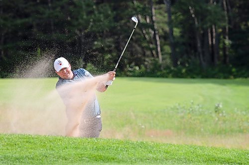 Dustin Dyck hits a bunker shot during the Tamarack golf tournament men's quarterfinals at Clear Lake Golf Course on Thursday. (Thomas Friesen/The Brandon Sun)