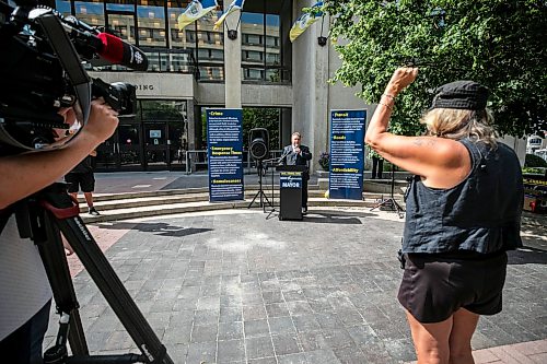 MIKAELA MACKENZIE / FREE PRESS
	
Mike Vogiatzakis does a campaign announcement in front of City Hall on Friday, Aug. 21, 2026.

For Joyanne story.
Free Press 2026