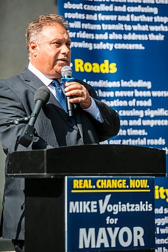 MIKAELA MACKENZIE / FREE PRESS
	
Mike Vogiatzakis does a campaign announcement in front of City Hall on Friday, Aug. 21, 2026.

For Joyanne story.
Free Press 2026