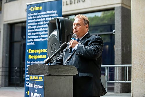 MIKAELA MACKENZIE / FREE PRESS
	
Mike Vogiatzakis does a campaign announcement in front of City Hall on Friday, Aug. 21, 2026.

For Joyanne story.
Free Press 2026