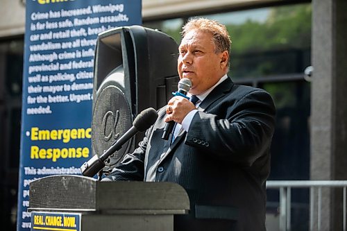 MIKAELA MACKENZIE / FREE PRESS
	
Mike Vogiatzakis does a campaign announcement in front of City Hall on Friday, Aug. 21, 2026.

For Joyanne story.
Free Press 2026