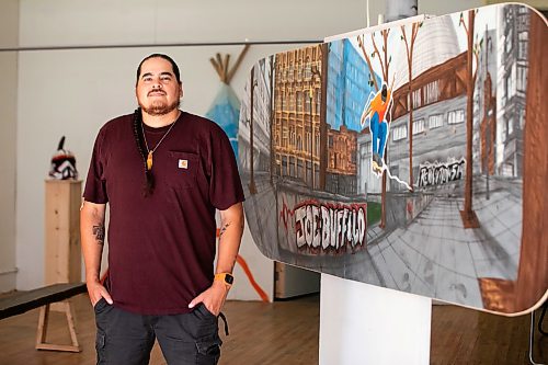 MIKAELA MACKENZIE / FREE PRESS
	
Muralist, carpenter, graphic designer, and artist Peatr Thomas in his Exchange District space on Friday, Aug. 21, 2026.

For Conrad story.
Free Press 2026