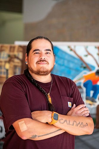 MIKAELA MACKENZIE / FREE PRESS
	
Muralist, carpenter, graphic designer, and artist Peatr Thomas in his Exchange District space on Friday, Aug. 21, 2026.

For Conrad story.
Free Press 2026