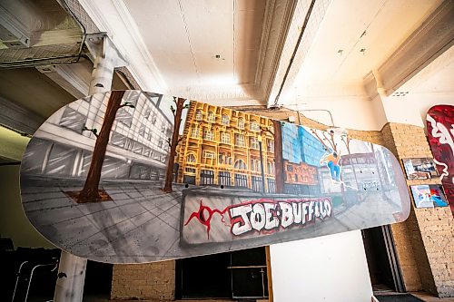 MIKAELA MACKENZIE / FREE PRESS
	
Muralist, carpenter, graphic designer, and artist Peatr Thomasՠwork in his Exchange District space on Friday, Aug. 21, 2026.

For Conrad story.
Free Press 2026
