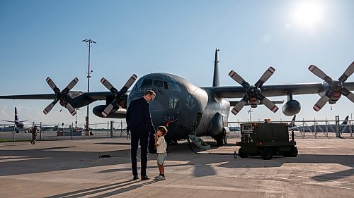 ROBERT LEE / FREE PRESS
People take in the enormous size, significance and stories of the iconic CC-130H Hercules that is standing down from service, marking the end of more than six decades of remarkable service to Canadians at the Royal Aviation Museum in Winnipeg on Friday, August 21, 2026. 