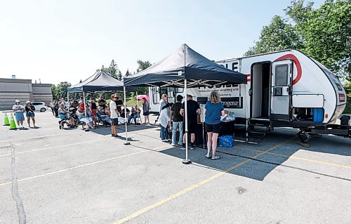 JOHN WOODS / FREE PRESS
People line up to have dermatologists examine their skin blemishes at a Melanoma Canada mobile skin cancer screening unit at Unicity Mall Sunday, August 23, 2026. Melanoma Canada is on a coast to coast tour performing drop in skin check clinics. Clinics occurred in Winnipeg Friday-Sunday.

reporter: standup