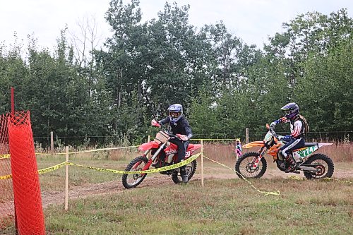 Manitoba Dirt Riders members ride during the annual Rivers Dirt Rodeo in Pendennis, about 31.5 kilometres northwest of Brandon, on Sunday afternoon. (Photos by Abiola Odutola/The Brandon Sun)