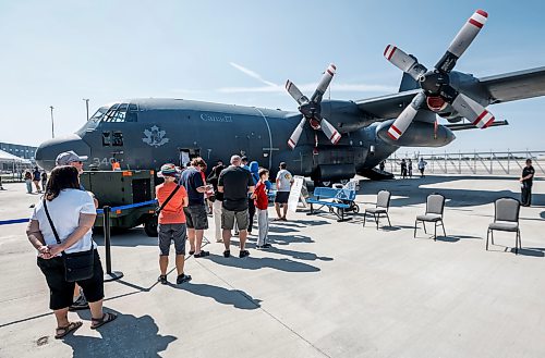 JOHN WOODS / FREE PRESS
People visit and view a CC-130H Hercules plane at the Royal Aviation Museum Sunday, August 23, 2026. The plane is being retired from the Canadian fleet.
reporter: standup