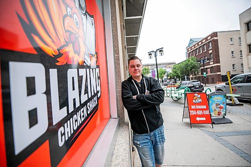 MIKAELA MACKENZIE / FREE PRESS
Eric Saniuk, owner of Blazing Chicken Shack on Graham Avenue, on Thursday, July 2, 2026. The fried chicken joint saw less customer traffic over the past year, likely due to buses being rerouted off Graham Avenue.
For Gabby story.
Free Press 2026