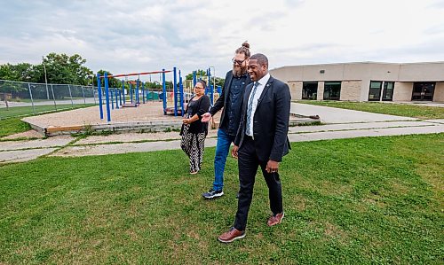 MIKE DEAL / FREE PRESS
Minister Jamie Moses (right), Adam Dobriansky (centre), principal, Lavallee School, and Lindsey Trudeau, vice-principal, Lavalle School, head towards the press conference walking past the old playground.
Jamie Moses, Minister of Business, Mining, Trade and Job Creation, announces that the province is investing $100,000 through the Healthy Kids, Healthy Communities Play Structure Fund to support the development of a new playground at Lavallee School in the Louis Riel School Division during a press conference held on the grounds of Lavallee School where the new playground will be built.
260824 - Monday, August 24, 2026.