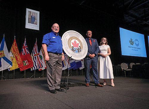 Ruth Bonneville / Free Press
LOCAL STDUP - mint coin
The Royal Canadian Mint unveils a special two dollar coin into circulation in honour of the 100th anniversary of The Royal Canadian Legion with (left to right) Berkley Lawrence, Dominion President, The Royal Canadian Legion
Simon Kamel, Interim President and CEO, Royal Canadian Mint
Vlada Pashchenko, Coin artistat, at the RBC Convention Centre Monday.
The event took place during the Legion’s 50th Dominion Convention in Winnipeg, Manitoba, marking the Legion’s century of support for veterans, their families and communities,
Aug 24th,, 2026