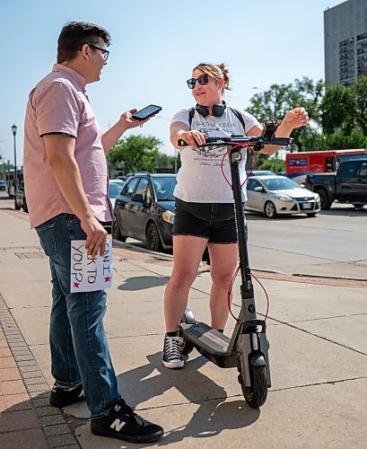 ROBERT LEE / FREE PRESS
Ashley Esquega rides her electric scooter through Winnipeg on Monday, August 24, 2026.