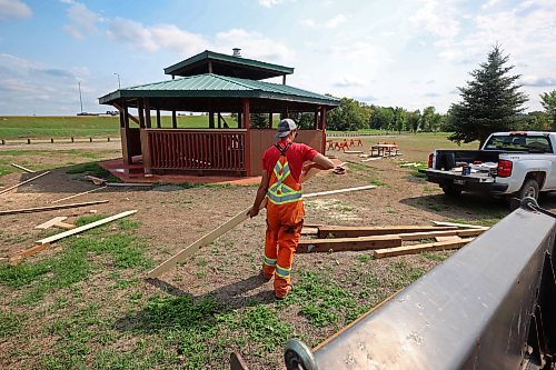 24082026
Peter Spelrem, a casual labourer with the City of Brandon cleans up supplies while working on the repaired gazebo at Dinsdale Park on Monday. Approximately 80% of the gazebo was replaced after it was damaged during the flooding earlier in the summer. (Tim Smith/The Brandon Sun)default