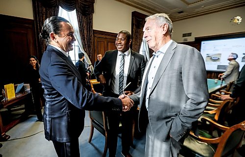 JOHN WOODS / FREE PRESS
Premier Wab Kinew, left, minister Jamie Moses, centre, talk with Gerry Price, CEO of Price Industries after they met with Manitoba business leaders, unions and indigenous leaders to discuss trade relations with the United States at the Manitoba Legislature Monday, August 24, 2026.
reporter: gabby
