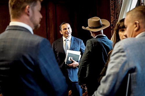 JOHN WOODS / FREE PRESS
Premier Wab Kinew talks with Matthew Atkinson, representing Manitoba Beef Producers and Canadian Cattle Association, after they met with Manitoba business leaders, unions and indigenous leaders to discuss trade relations with the United States at the Manitoba Legislature Monday, August 24, 2026.
reporter: gabby